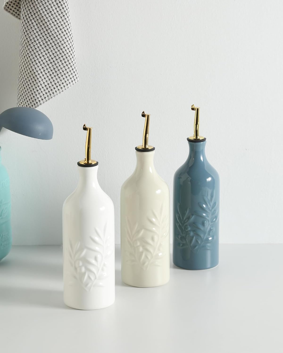 Sweejar Ceramic Olive Oil Dispenser Bottle 20 Oz Relief Opaque Oil Cruet Protects To Reduce Oxidation Suitable for Storage Vinegar, Soy Sauce, Coffee Syrup, Liquids, Set of 1 (Fogblue Gold Spout)