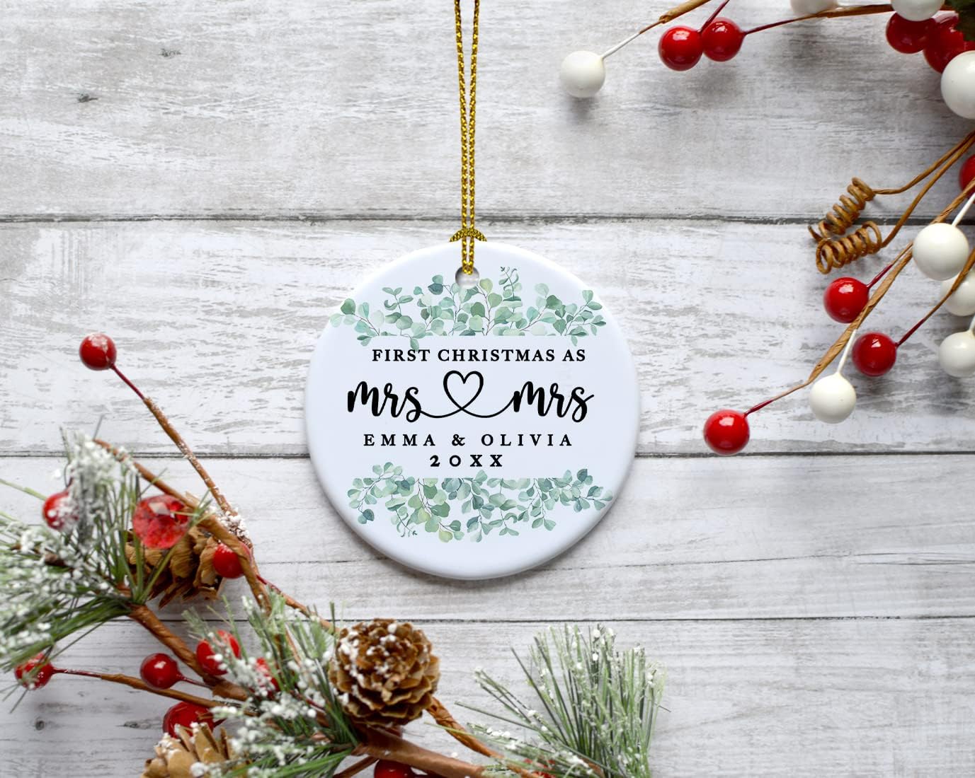 Andaz Press Personalized Our First Christmas As Mrs. & Mrs. 2025 Christmas Ornaments Greenery Eucalyptus 2.8" Round Porcelain Ceramic Lesbian Married Couple Gay Women Newlyweds Keepsake 1-Pack