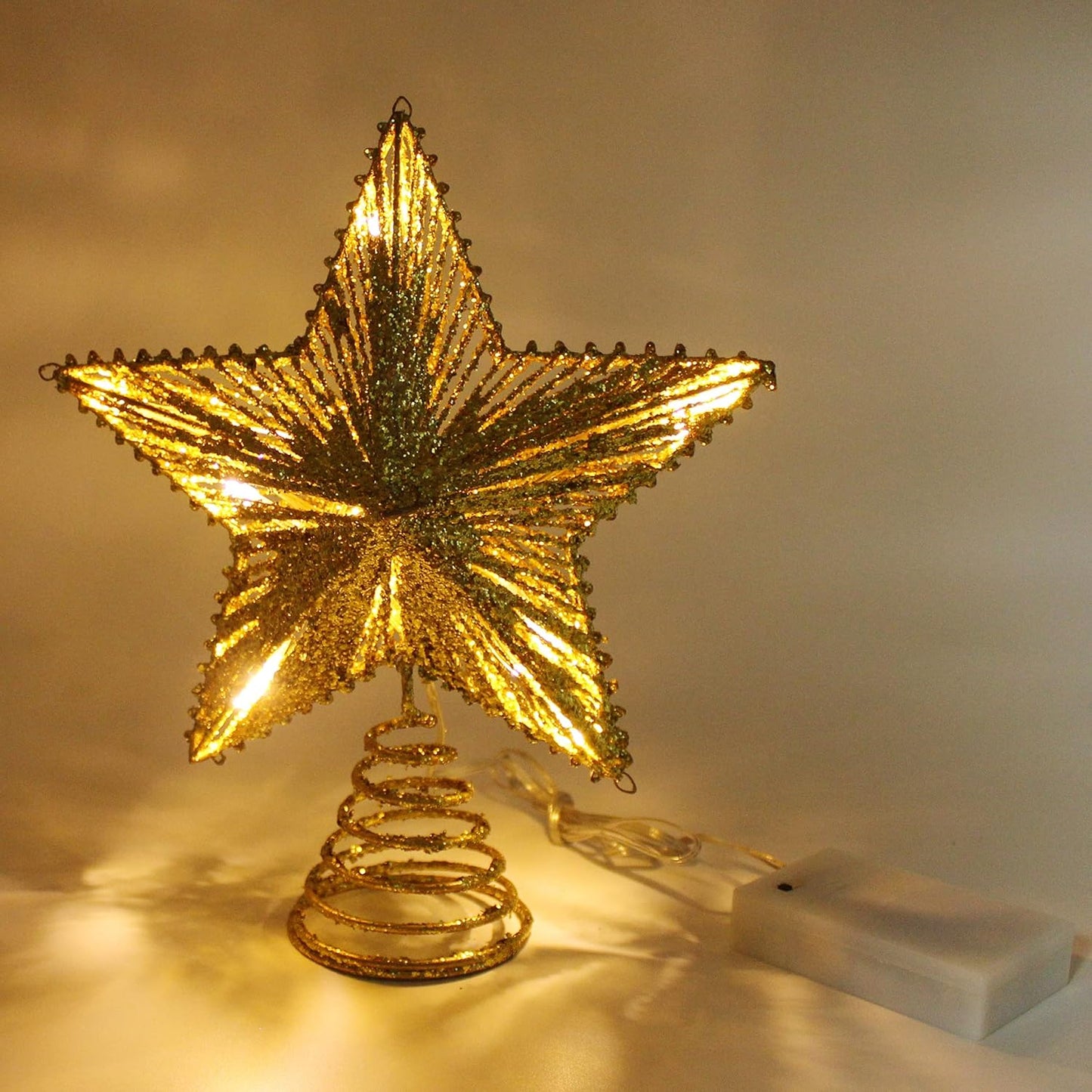 CVHOMEDECO. Gold Glittered 3D Tree Top Star with Warm White LED Lights and Timer for Christmas Tree Decoration and Holiday Seasonal Décor, 8 x 10 Inch