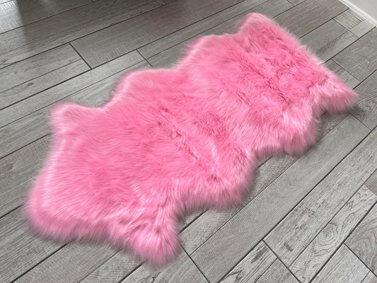 LAMBZY Faux Sheepskin Super Soft Hypoallergenic Free Shape Silky Shag Rug, Luxury Shaggy Plush Carpet for Bedrooms Living Kids Room Sofa Rugs (Pink, Single and a Half 2'x4')